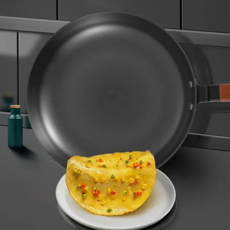 Poêle à frire en fonte alvéolée